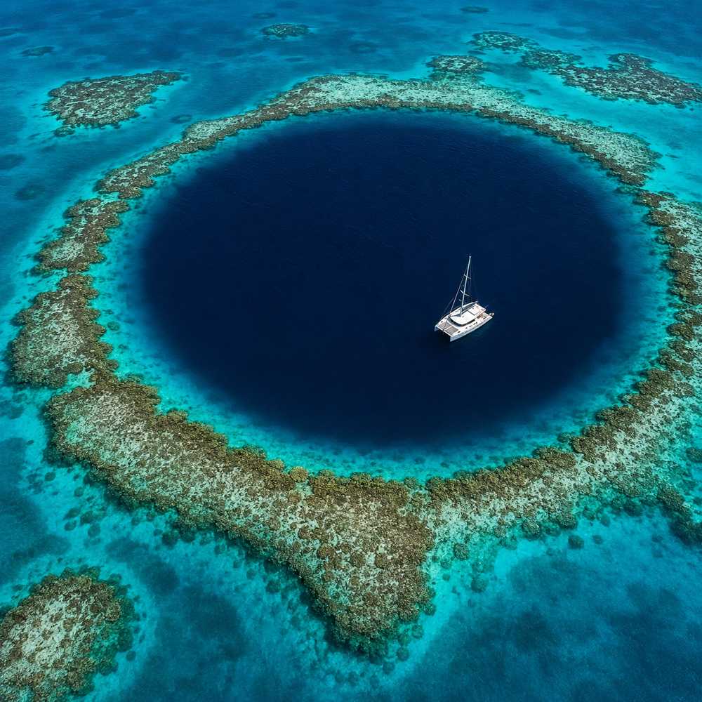 Aerial view of the Great Blue Hole and Belize Barrier Reef